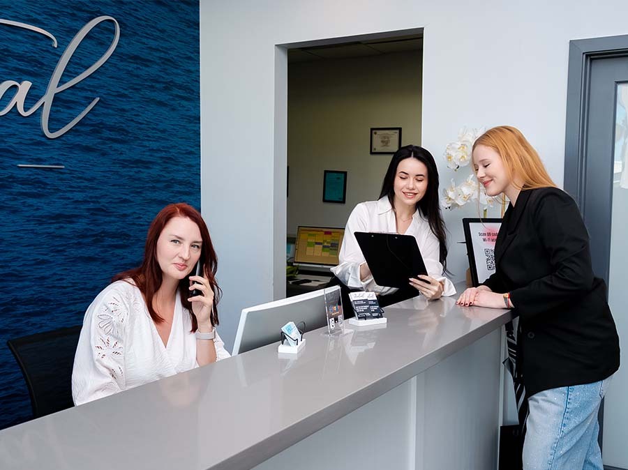 Patient receiving routine dental care through membership plan at Dental Pearl Miami in North Miami Beach FL