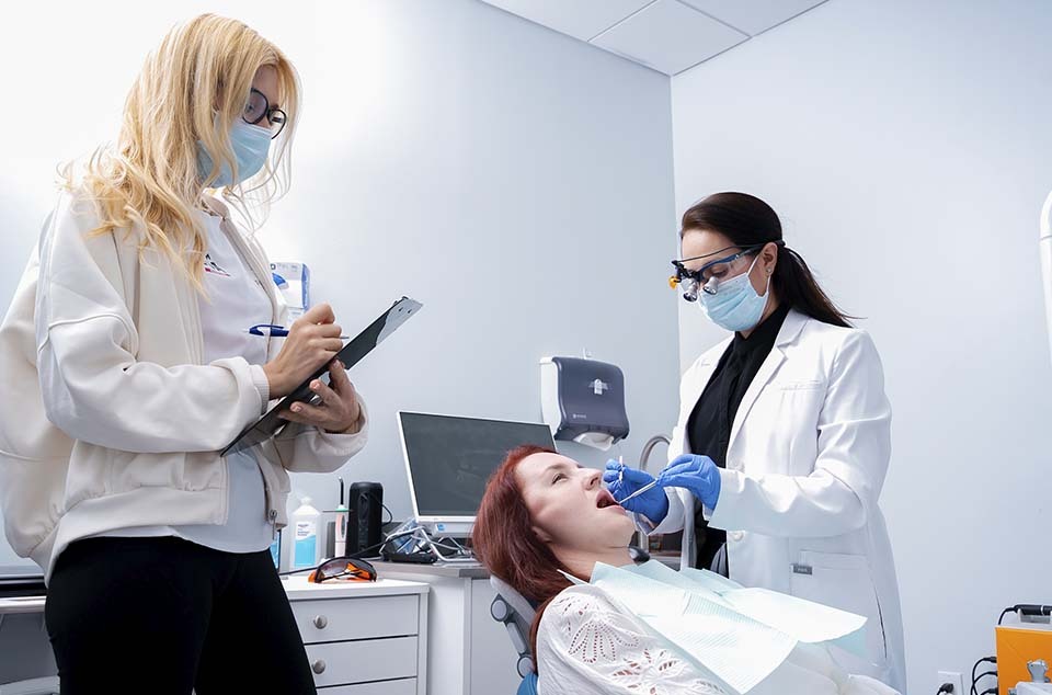 Patient consultation for dental conditions at Dental Pearl Miami in North Miami Beach FL