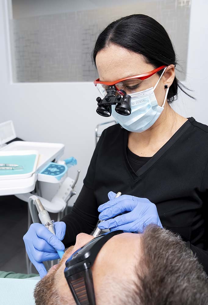Periodontal treatment to remove bacteria and reduce gum pockets at Dental Pearl in North Miami Beach for advanced gum disease care