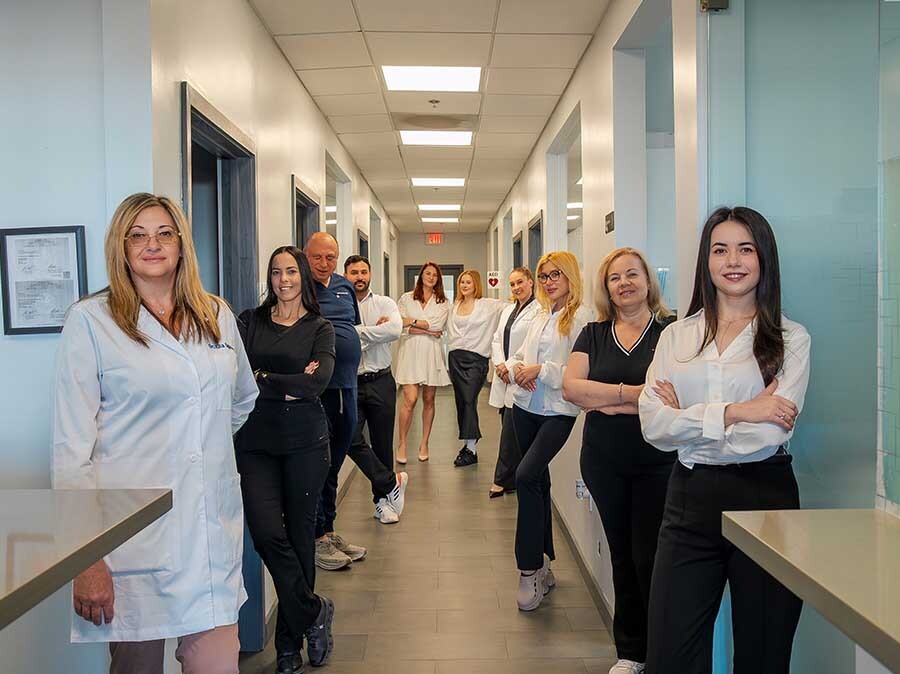 Dental Pearl Miami team assisting patients with insurance coverage at dental office in North Miami Beach FL