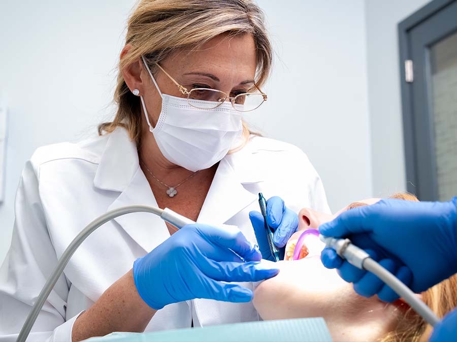 Root canal procedure performed by Dr. Ella Dekhtyar at Dental Pearl in North Miami Beach FL treating infected tooth pulp with advanced endodontic care